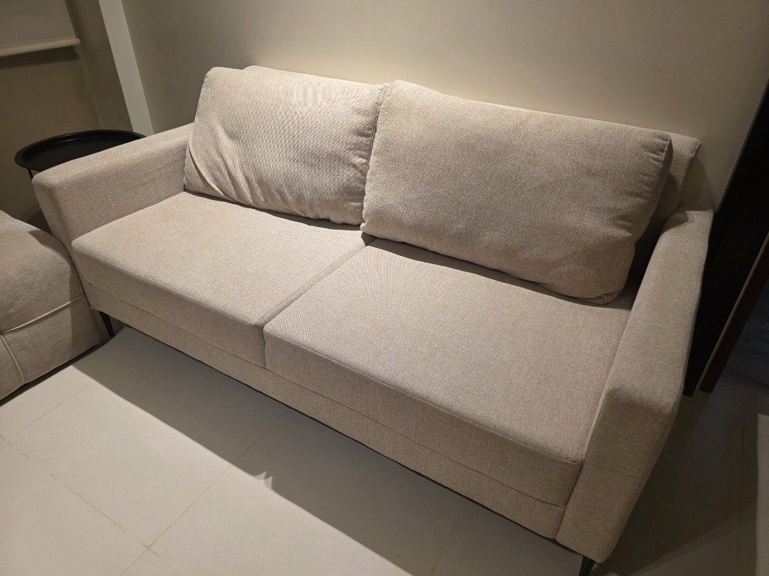 Beige 2-Seater Sofa with Cushions (Category: Sofas) located in Pasig City. Submitted by ljcordial (Listing ID 1460422646, Image 2). Description: Specifications: Size: 2 Seater Width: 170.1 cm Depth: 85.2 cm Height: 88.6 cm Color: Beige Material: Fabric Note: Almost new, bought last June 2026.