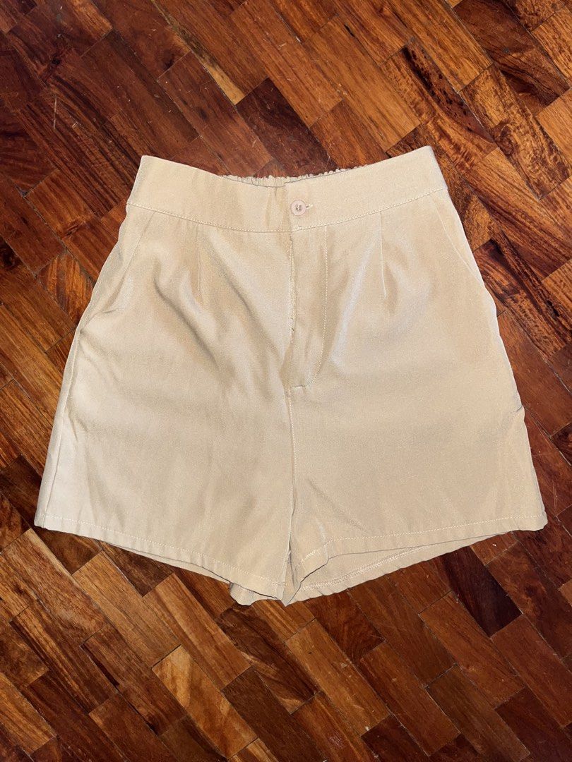 Beige Cropped Blazer Top and Shorts Set (Category: Sets or Coordinates) located in Taguig. Submitted by novealiennn (Listing ID 1451593126, Image 3). Description: - Cute beige two-piece set - Cropped blazer-style top with double buttons - Matching high-waisted shorts - Shorts feature pockets and elastic back for comfort - Perfect for casual or dressed-up looks - Can be worn together or separately.
