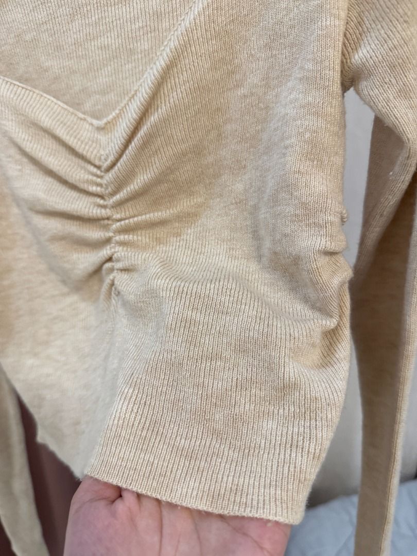 Beige Ruched V-Neck Long Sleeve Cropped Top (Category: Longsleeves) located in Butuan. Submitted by notcwp (Listing ID 1460333717, Image 2). Description: - Cute beige long sleeve top - Flattering ruched detail at the front - V-neckline - Soft and stretchy material - Versatile: pairs well with jeans or skirts - Ideal for casual outings or nights with friends - Easy to style and comfortable to wear.