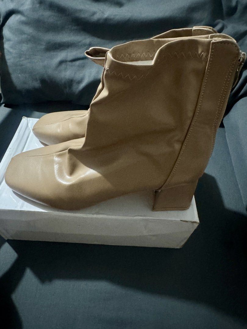 Beige Square Toe Ankle Boots (Category: Boots) located in Quezon City. Submitted by r.zzzzz (Listing ID 1460456954, Image 2). Description: - Beige ankle boots - Square toe - Elasticated shaft for a snug fit - Low block heel - Zipper closure at the back - Great for everyday wear - Only used once in Japan - Size: 39.