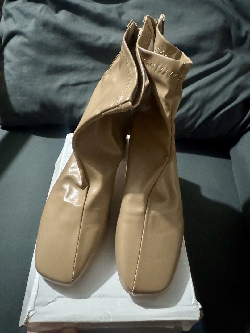 Beige Square Toe Ankle Boots (Category: Boots) located in Quezon City. Submitted by r.zzzzz (Listing ID 1460456954, Image 3). Description: - Beige ankle boots - Square toe - Elasticated shaft for a snug fit - Low block heel - Zipper closure at the back - Great for everyday wear - Only used once in Japan - Size: 39.