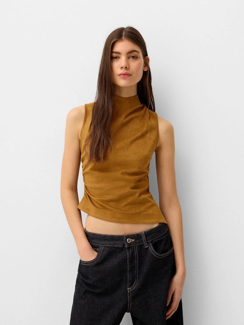 BERSHKA Brown Suede Sleeveless Top (Category: Sleeveless) located in Cebu City. Submitted by zarizariii___ (Listing ID 1460322478, Image 2). Description: Used twice!! Got this for ₱2k.