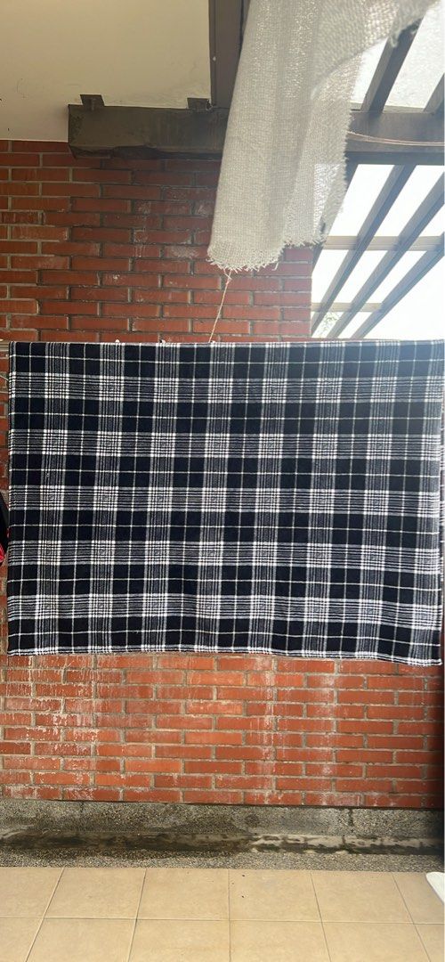 Black and White Plaid Blanket (Category: Bedding & Towels) located in Manila. Submitted by brownqueen65310 (Listing ID 1460387890, Image 1). Description: Black and White Plaid Blanket - Cozy plaid blanket in a classic black and white pattern - Single size: 50 inches by 68 inches - 100% polyester easy to care for and maintain Good for: - Snuggling on the couch or adding warmth to your bed.