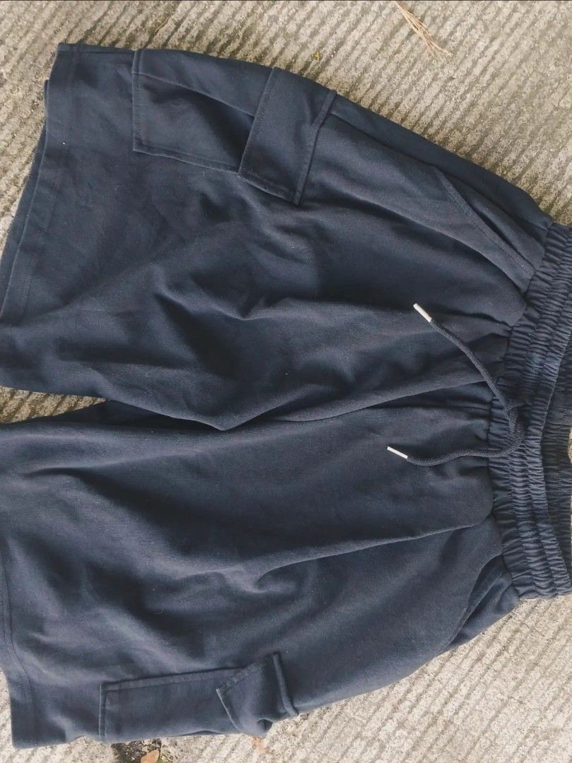 Black Cargo Shorts with Drawstring Waist (Category: Shorts) located in Manila. Submitted by corsethrift (Listing ID 1460410185, Image 1). Description: - Comfortable black cargo shorts - Elastic waistband with adjustable drawstring - Two side pockets with secure flap closures - Ideal for casual, everyday wear - Versatile: pairs well with t-shirts and hoodies.