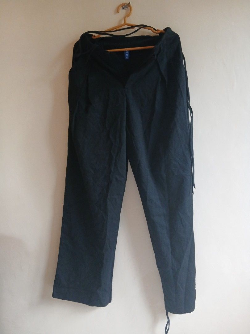 Black drawstring pants (Category: Other Bottoms) located in Tayabas. Submitted by ahrcelllego (Listing ID 1460318209, Image 1). Description: - Comfortable black pants with drawstring waist - Ideal for lounging or running errands - Fabric resembles linen or a linen blend - Versatile for styling with various tops.