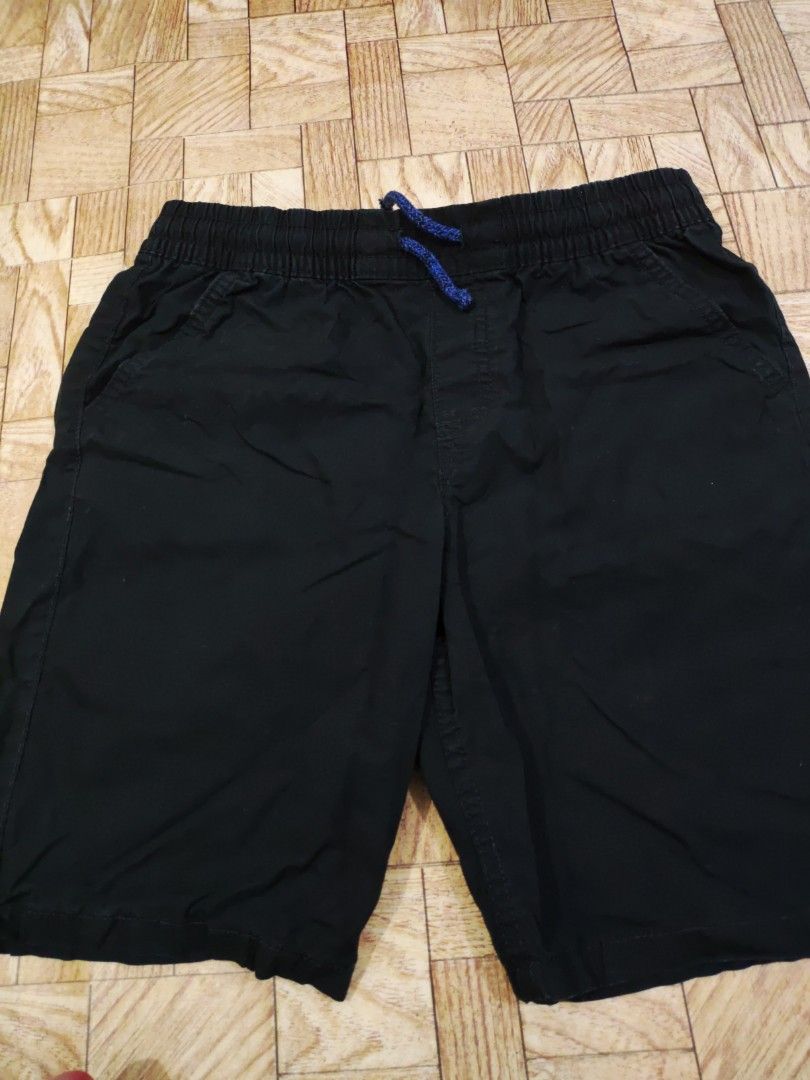 Black drawstring shorts (Category: Shorts) located in Paranaque City. Submitted by jtaguirre (Listing ID 1460407141, Image 1). Description: - Black shorts - Elastic waistband with drawstring - Side pockets - Comfortable for everyday wear - Ideal for lounging or casual outings.