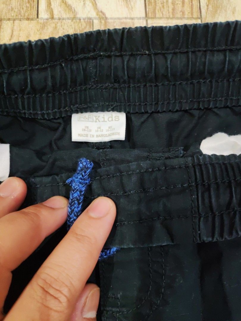 Black drawstring shorts (Category: Shorts) located in Paranaque City. Submitted by jtaguirre (Listing ID 1460407141, Image 2). Description: - Black shorts - Elastic waistband with drawstring - Side pockets - Comfortable for everyday wear - Ideal for lounging or casual outings.