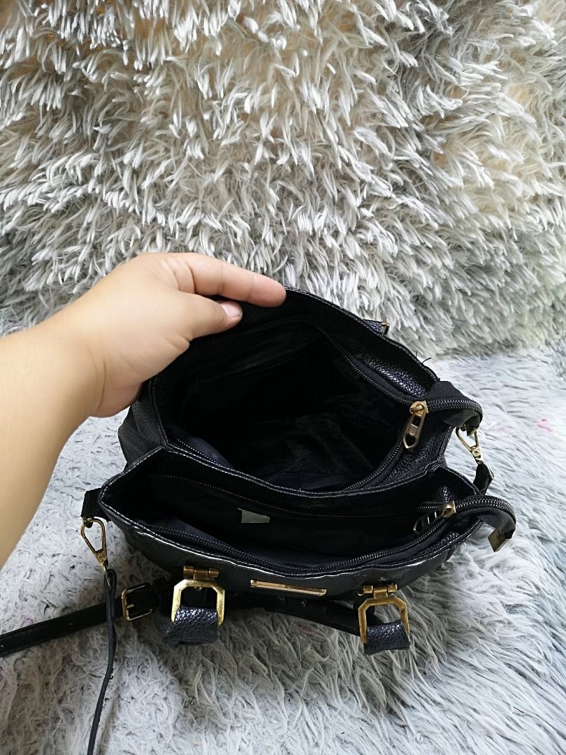 Black Faux Leather Top Handle Bag (Category: Purses & Pouches) located in Santa Cruz. Submitted by jmy_surplus.2 (Listing ID 1460452713, Image 2). Description: Size ; L - 8 W - 10 Color ; Black Type ; Hand bag Brand ; No Brand Material ; Leather Style ; Black leather Hand bag LR 169 JMY 5 Batch #218.