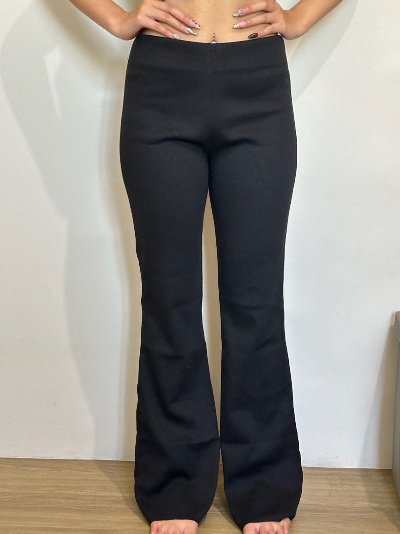 Black Flare Ribbed Pants (Category: Other Bottoms) located in Pasay City. Submitted by nicoletlntn_ (Listing ID 1460479612, Image 1). Description: Comfy black flare pants with a ribbed texture. High-waisted and stretchy. Perfect for any occasion!.