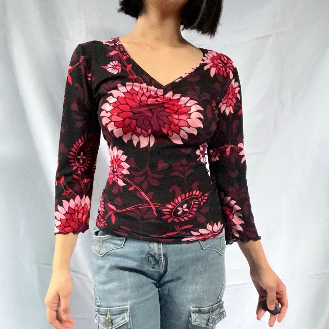 Black Floral Mesh Long Sleeve Top (Category: Longsleeves) located in Manila. Submitted by demi.rewears (Listing ID 1460314961, Image 3). Description: Cute sheer black mesh top with pink/red floral print. Features ruched bust and lettuce hem sleeves. Stretchy fabric. Versatile for night out or casual wear. Bust: 16” (Flat) / Fits up to 32” Bust Length: 22.5” Sleeve Style: 3/4 Sleeves with Lettuce Trim Neckline: Ruched V-Neck Pattern: Bold Floral /