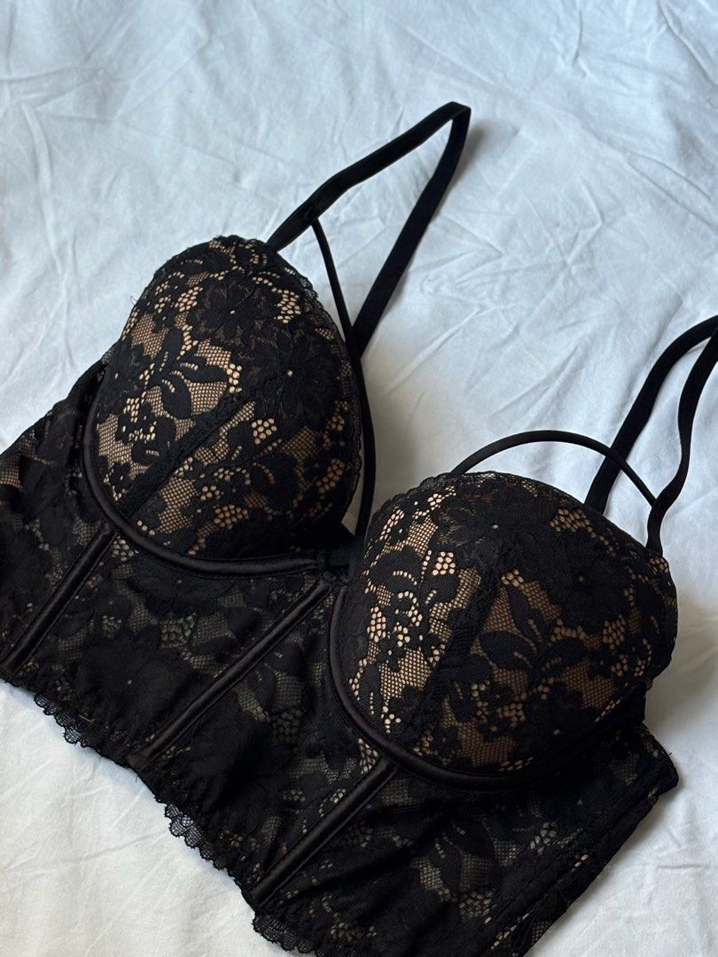 Black Lace Corset Bra with Straps - Size 36B (Category: Undergarments & Loungewear) located in Pasay City. Submitted by nicoletlntn_ (Listing ID 1460480604, Image 1). Description: - Black lace corset bra - Nude lining for contrast - Adjustable straps - Underwire for support - Lace trim along bottom hem - Perfect for layering or wearing alone.