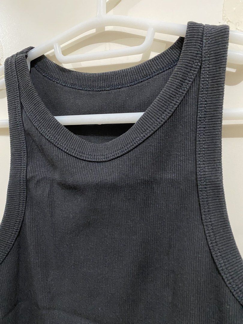 Black Ribbed Racerback Tank Top (Category: Sleeveless) located in Taguig. Submitted by maly01_ (Listing ID 1460371306, Image 2). Description: - fits small to medium frames dm for inquiries.