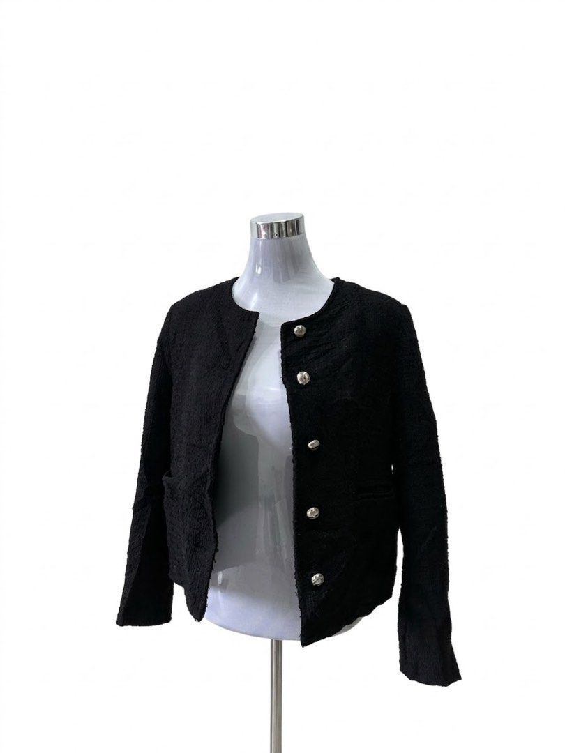 Black Textured Tweed Blazer with Silver Buttons (Category: Coats, Jackets and Outerwear) located in Manila. Submitted by gentle.bagmomma (Listing ID 1460342351, Image 1). Description: - Black textured cropped jacket - Round neckline with silver button closure - Two front pockets - Versatile: pairs well with jeans or skirts.