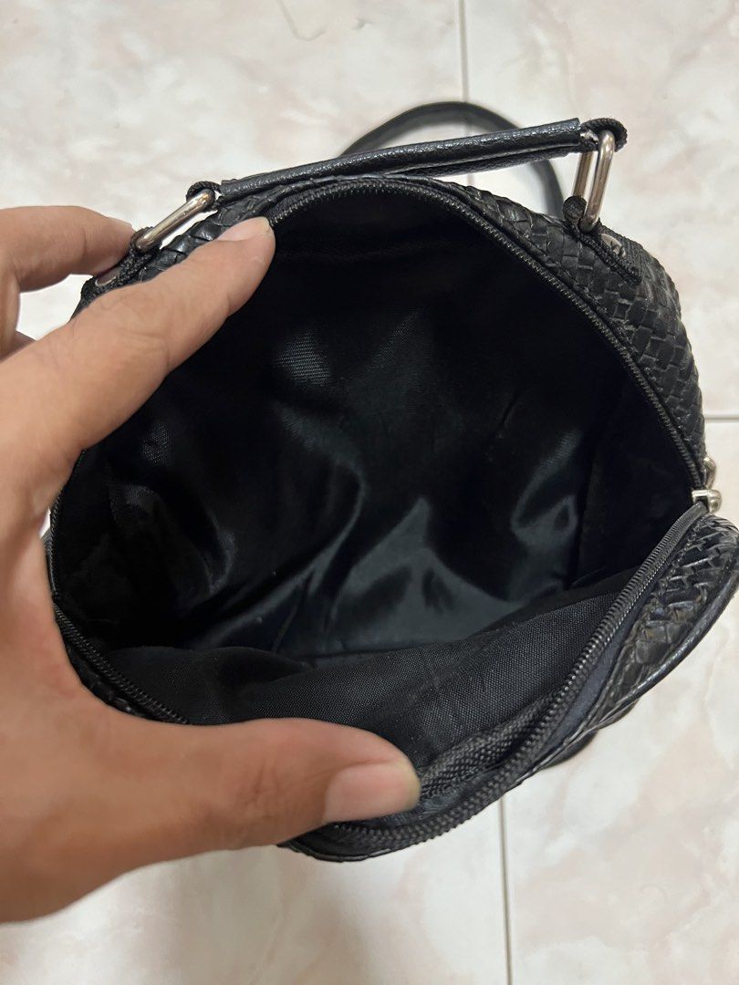 Black woven crossbody bag (Category: Cross-body Bags) located in Manila. Submitted by rlab_japan_thrift (Listing ID 1460393433, Image 2). Description: Black Woven Crossbody & Shoulder Bag Sleek black sling bag featuring a classic woven texture, front flap slip pocket, top handle, and adjustable shoulder strap. Zippered main compartment keeps essentials secure and organized for daily use. * Style: Woven Crossbody / Shoulder Bag * Width: Approx. 8.