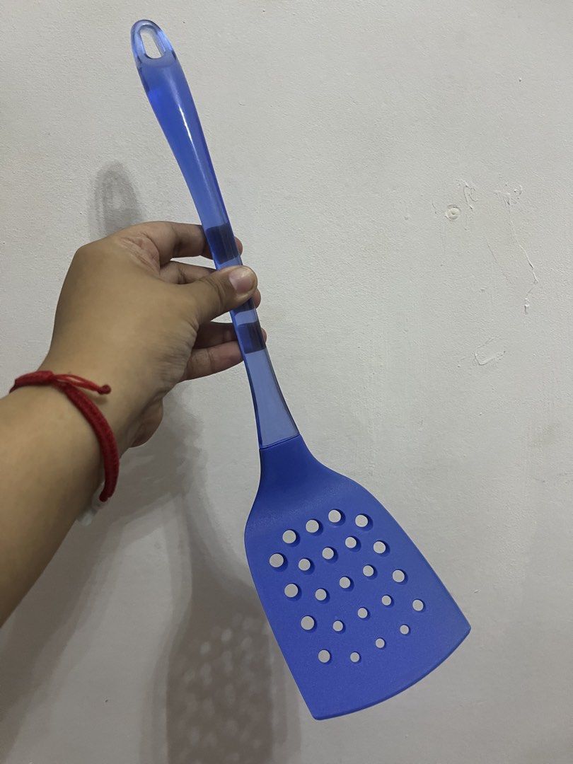 Blue and Black Spatula Set for Cooking (Category: Other Kitchenware & Tableware) located in Dasmarinas. Submitted by purpleboxmidori (Listing ID 1460471227, Image 2). Description: - Set of 2 versatile spatulas - 1 blue spatula with transparent handle (small holes) - 1 black spatula (wider slots) - Slotted design for easy draining - Ideal for flipping food during cooking - Must-have kitchen essentials.