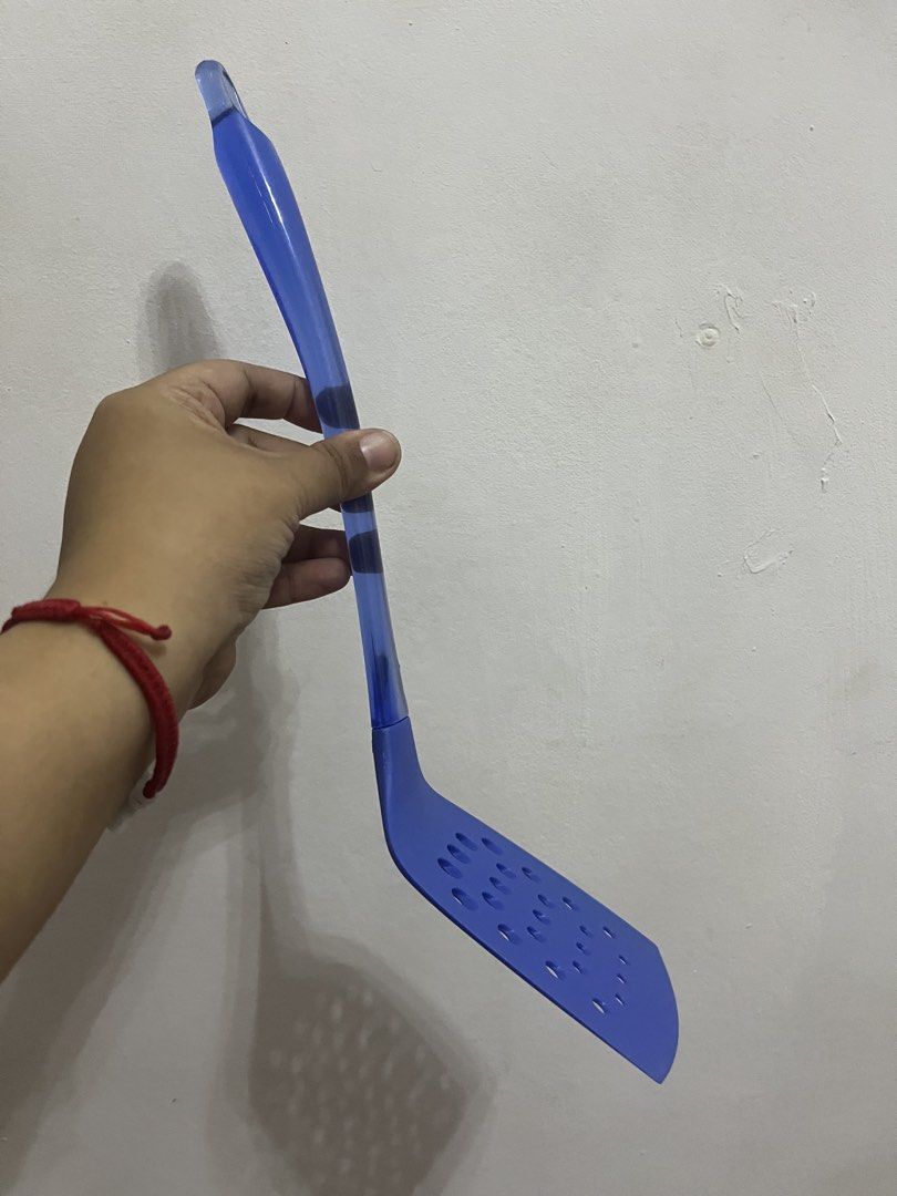 Blue and Black Spatula Set for Cooking (Category: Other Kitchenware & Tableware) located in Dasmarinas. Submitted by purpleboxmidori (Listing ID 1460471227, Image 3). Description: - Set of 2 versatile spatulas - 1 blue spatula with transparent handle (small holes) - 1 black spatula (wider slots) - Slotted design for easy draining - Ideal for flipping food during cooking - Must-have kitchen essentials.