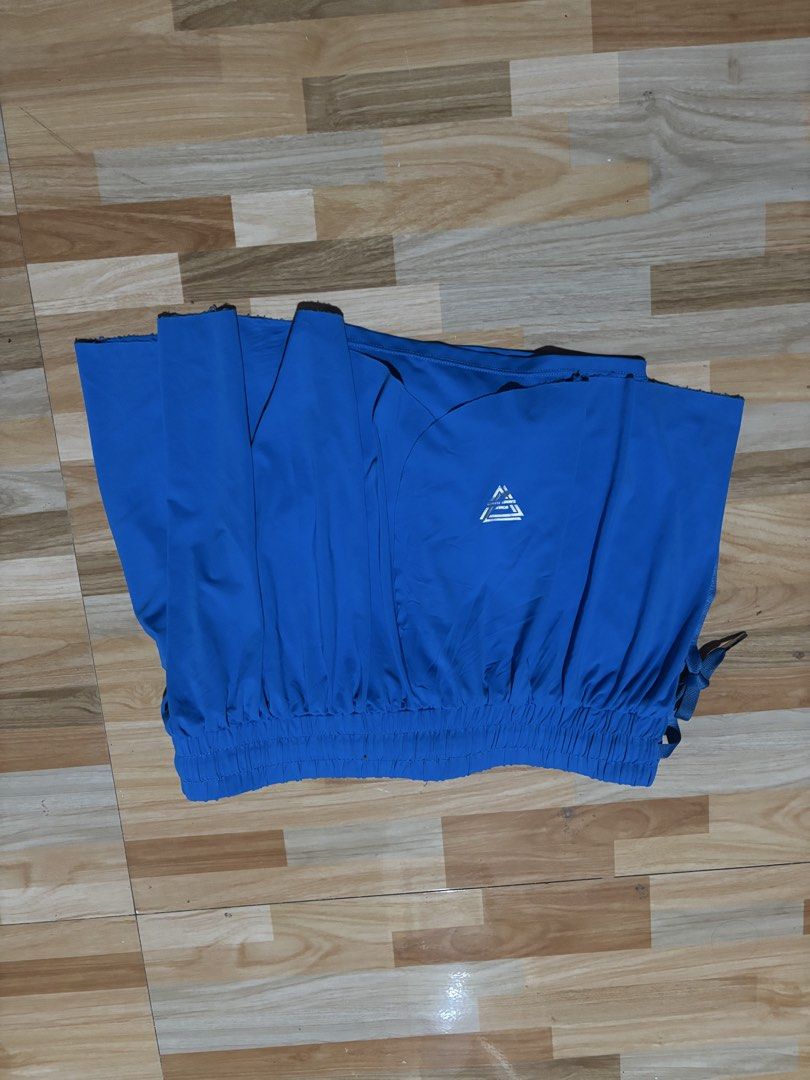 Blue Athletic Shorts with Built-in Liner (Category: Racket and Ball Sports) located in Tubigon. Submitted by wawiesunbe75372 (Listing ID 1460445239, Image 2). Description: - Blue athletic shorts - Elastic waistband with drawstring - Built-in liner for comfort and support - Small logo detail on the right leg - Ideal for running, gym, or any workout - Fits waist sizes 26-38 inches - Length: L12.