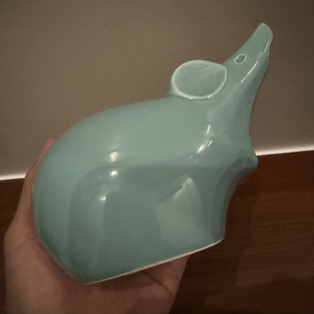 Blue celadon ceramic mouse figurine (Category: Designer & Blind Box Toys) located in Bulacan. Submitted by prelovedetc (Listing ID 1460431511, Image 2). Description: Blue celadon ceramic mouse figurine with a sleek, minimalist design. Good as new. No box. Size is 6inches x 4 inches (tip).