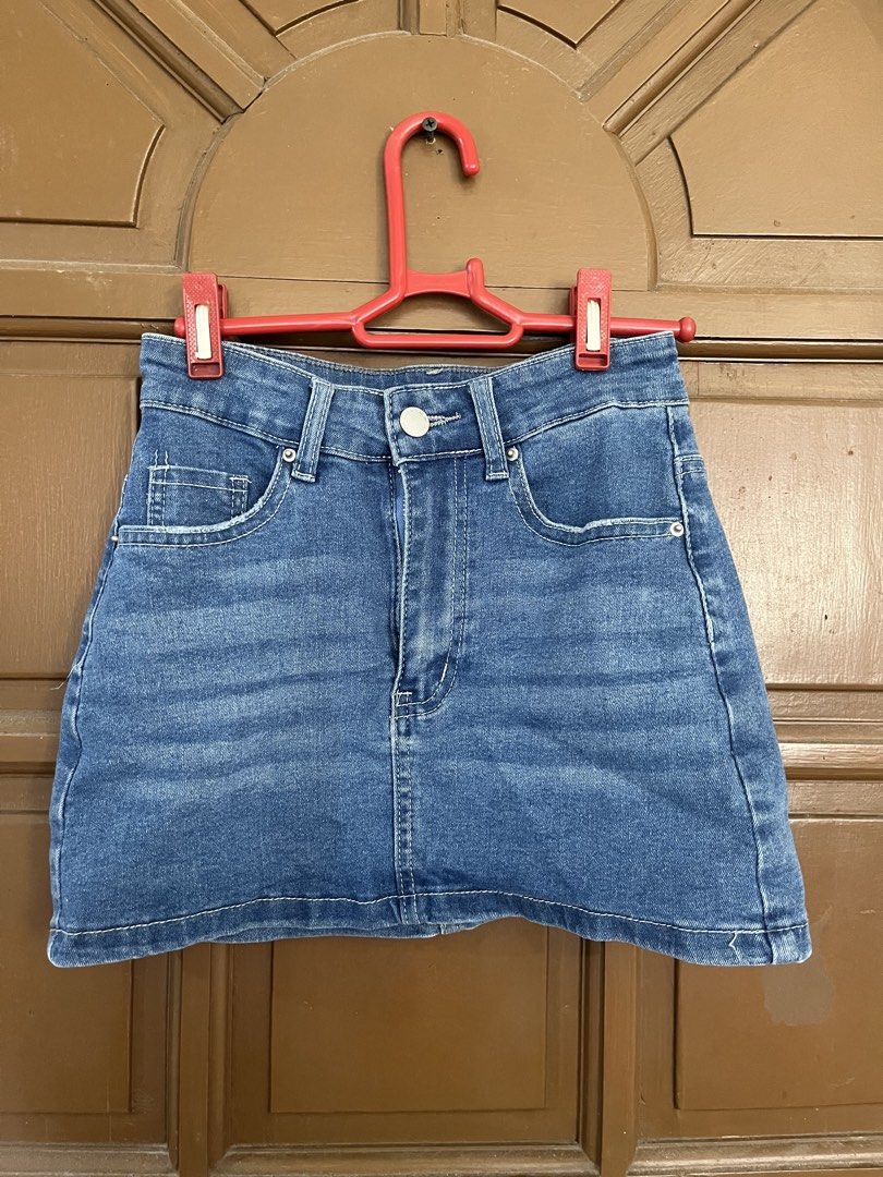 Blue Denim A-Line Mini Skirt (Category: Skirts) located in Manila. Submitted by ellesmr122 (Listing ID 1460323454, Image 1). Description: - Classic blue denim mini skirt - A-line cut - Frayed hem detail - Two back pockets - Button and zip closure - Versatile: pairs well with t-shirts or blouses.