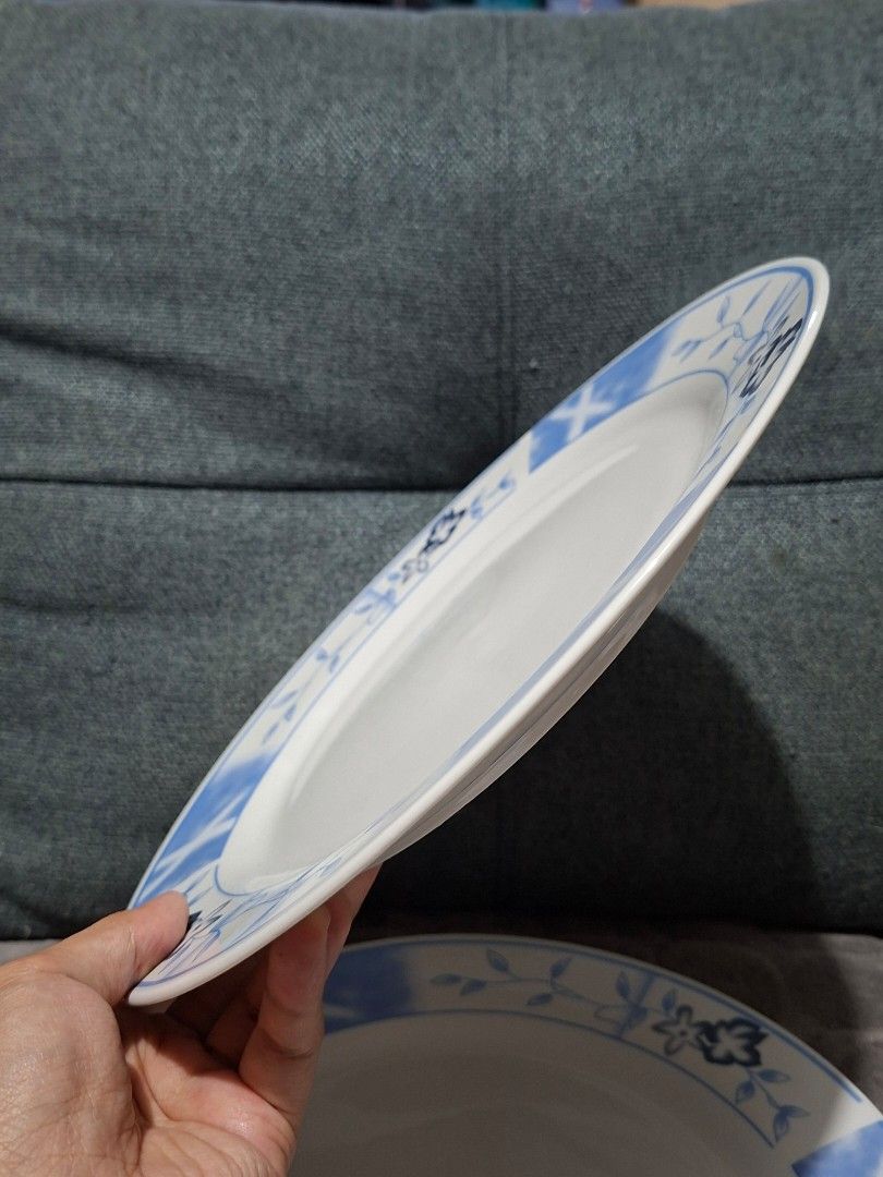 Blue Floral Ceramic Dinnerware Set with Cups (Category: Dinnerware & Cutlery) located in Taguig. Submitted by thrift_outlet.taguig (Listing ID 1460480017, Image 3). Description: 4 pcs. Blue Flower Design Plates 10.5" and 4 pcs. Mugs 2.2" - NEVER used - Set of ceramic plates and cups - Features a charming blue floral design with a watercolor-like pattern - Perfect for guests or daily use - Dishwasher safe - No chips or cracks.