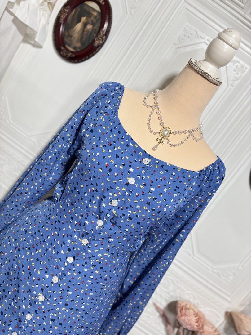 Blue Printed Buttondown Maxi Dress (Category: Dresses) located in San Jose. Submitted by vintagely_retro (Listing ID 1460469843, Image 2). Description: No lining but not see through | working buttons | with back ties Measurements Frame Medium Bust: 36” Waist: 32” Length: 44” .
