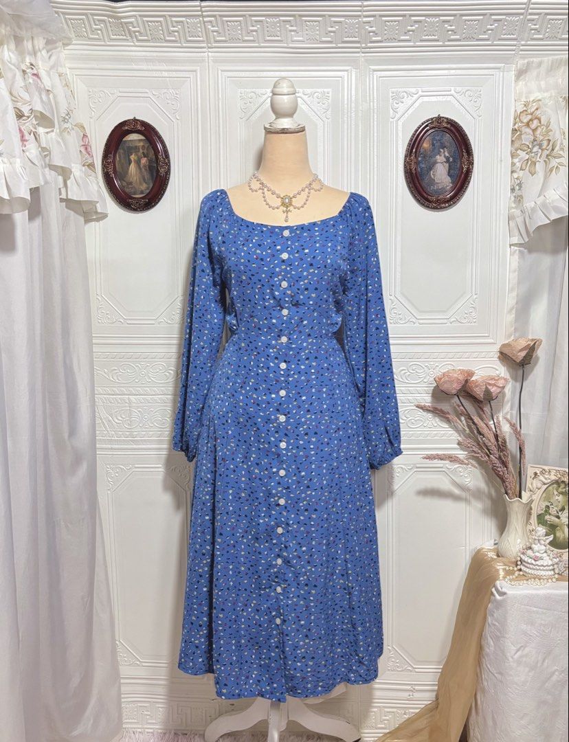 Blue Printed Buttondown Maxi Dress (Category: Dresses) located in San Jose. Submitted by vintagely_retro (Listing ID 1460469843, Image 1). Description: No lining but not see through | working buttons | with back ties Measurements Frame Medium Bust: 36” Waist: 32” Length: 44” .