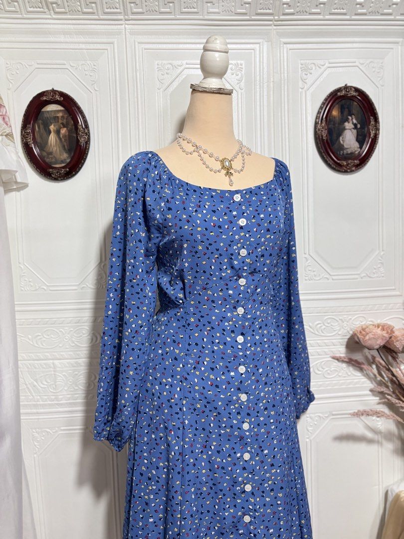 Blue Printed Buttondown Maxi Dress (Category: Dresses) located in San Jose. Submitted by vintagely_retro (Listing ID 1460469843, Image 3). Description: No lining but not see through | working buttons | with back ties Measurements Frame Medium Bust: 36” Waist: 32” Length: 44” .