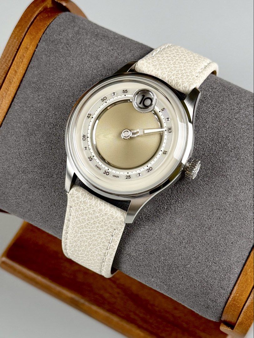 BNIB Christopher Ward “C1 Jump Hour - Dawn” Swiss Automatic (Category: Men's Watches) located in Quezon City. Submitted by fluxcapacitorjp (Listing ID 1460486268, Image 3). Description: BNIB Christopher Ward “C1 Jump Hour - Dawn” Swiss Automatic - Brand new. - Complete set. - 39mm case diameter. - Sapphire crystal with AR coating. - Stainless steel case. - Sand fine, Italian leather strap. - Dawn, patterned dial. - Luminous hand and markers. - Ju