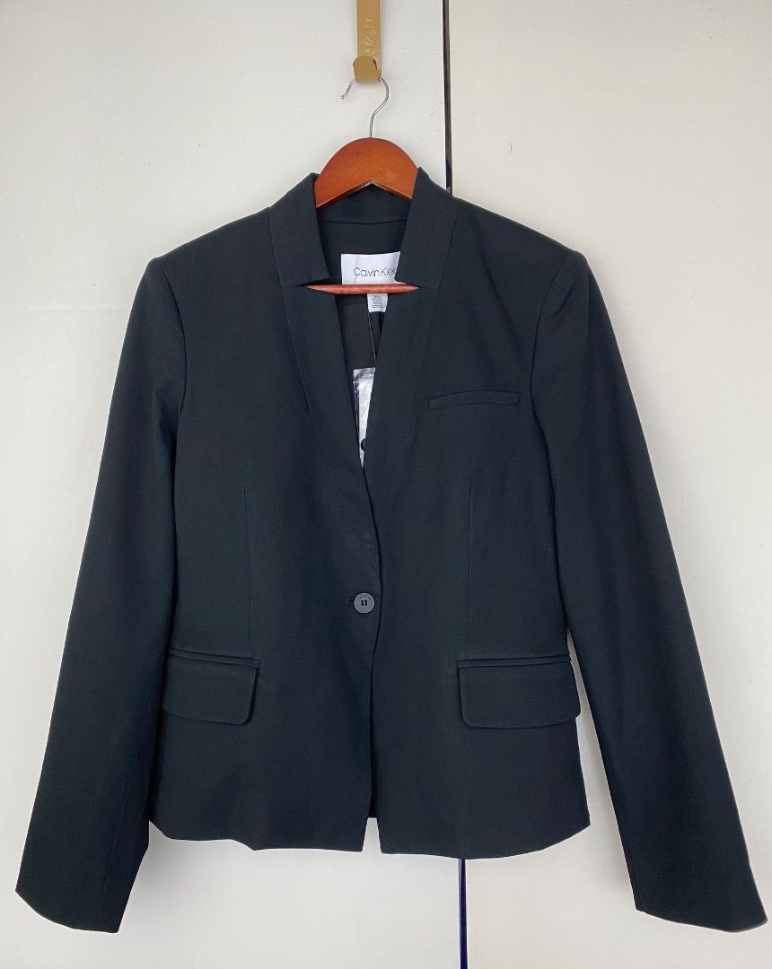 BNWT Calvin Klein Black Blazer Size 10 (Category: Coats, Jackets and Outerwear) located in Makati City. Submitted by roseaiscloset (Listing ID 1460383747, Image 1). Description: - Classic black blazer by Calvin Klein - Size 10 - Single button closure - Two front pockets - Brand new with original tags attached - Versatile for work or evening wear Bought from the US, never used, was stored and forgotten.