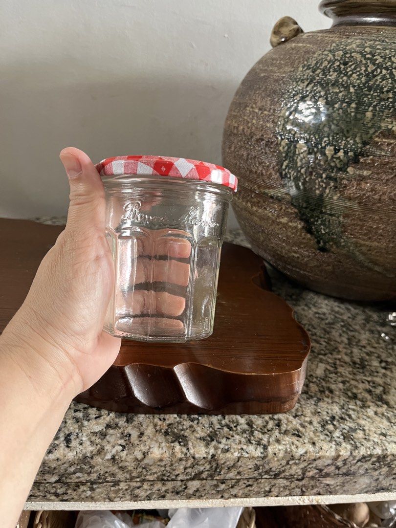 Bonne Maman Jam Jar with Gingham Lid (Category: Food Organization & Storage) located in Taguig. Submitted by minmin_parker (Listing ID 1460365209, Image 2). Description: - Adorable Bonne Maman jam jar - Classic hexagonal shape - Features a red and white gingham lid - Ideal for storing small items, crafts, or as a decorative accent - Clean and ready for its next home.