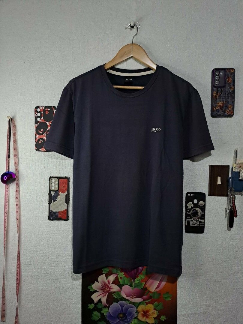 Boss Hugo Boss T - Shirt 2 - Pack (Category: Tshirts & Polo Shirts ) located in Quezon City. Submitted by yaseen73 (Listing ID 1460312523, Image 1). Description: Boss By Hugo Boss Navy Blue Embossed Logo Spandex Cotton Wearing Size : Large Pit to Pit Width 22 Lenght 28 Color Rate 9/10 Good Condition 500 Shipped Via J&T Express Around Metro Manila Seller's Location: 📍Brgy. Pansol, Q.C.