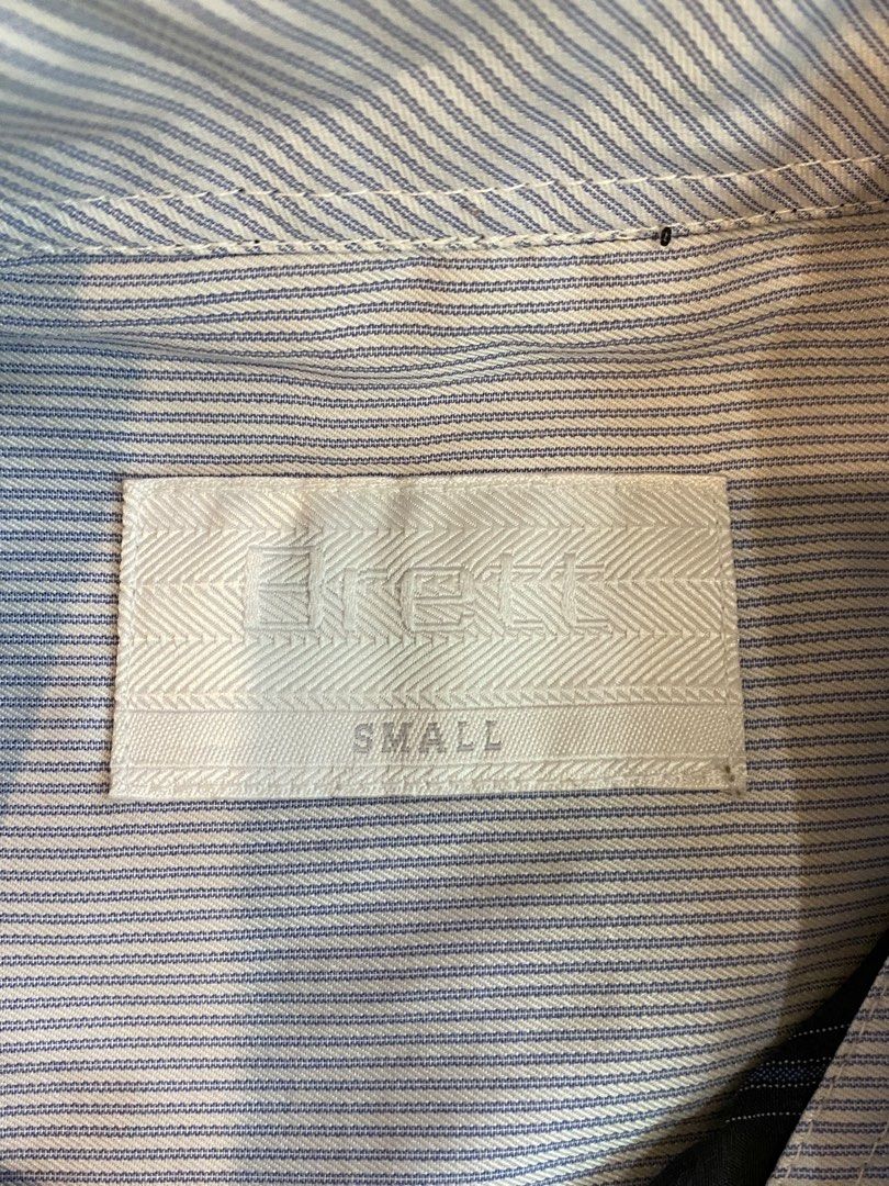 BRECK Men's Striped Button-Up Shirt Size Small (Category: Tshirts & Polo Shirts ) located in Manila. Submitted by sebthrift (Listing ID 1460358052, Image 2). Description: - BRECK striped button-up shirt - Features intricate embroidery on front and cuffs - Classic collar and button closure - Perfect for night out or smart casual look - Size: Small.