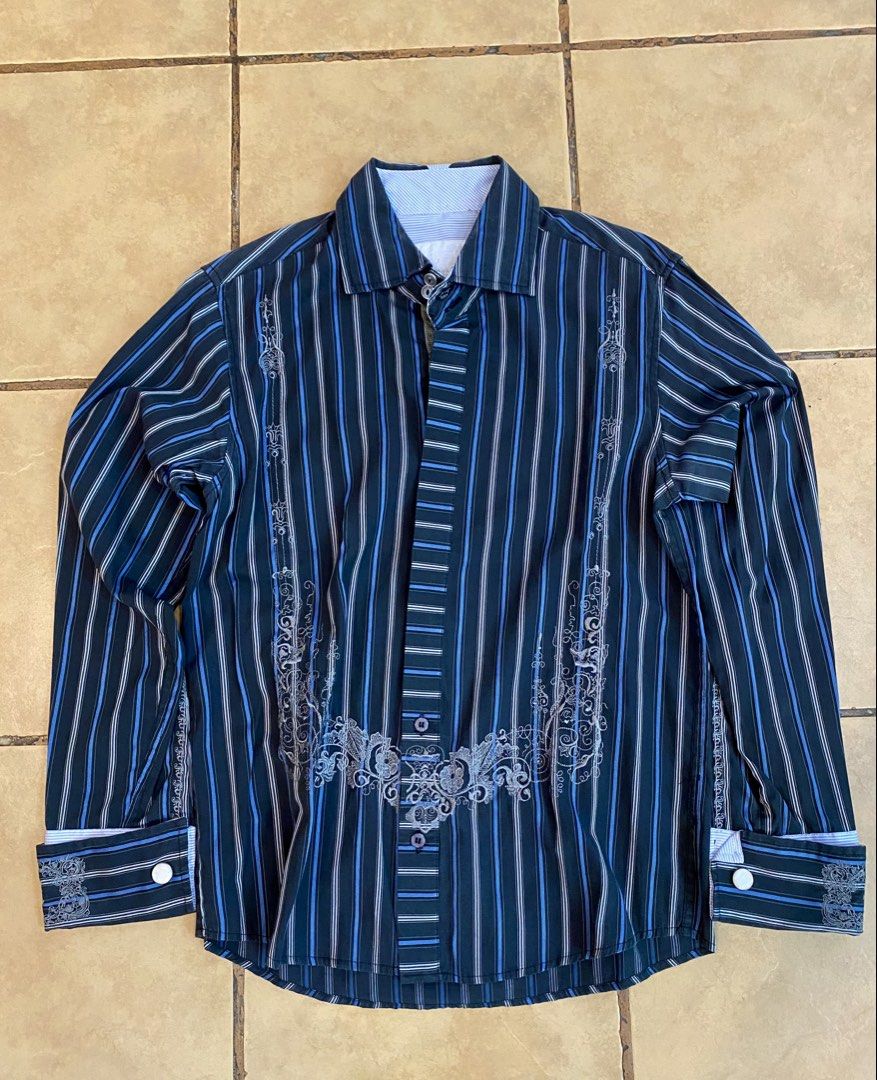 BRECK Men's Striped Button-Up Shirt Size Small (Category: Tshirts & Polo Shirts ) located in Manila. Submitted by sebthrift (Listing ID 1460358052, Image 1). Description: - BRECK striped button-up shirt - Features intricate embroidery on front and cuffs - Classic collar and button closure - Perfect for night out or smart casual look - Size: Small.