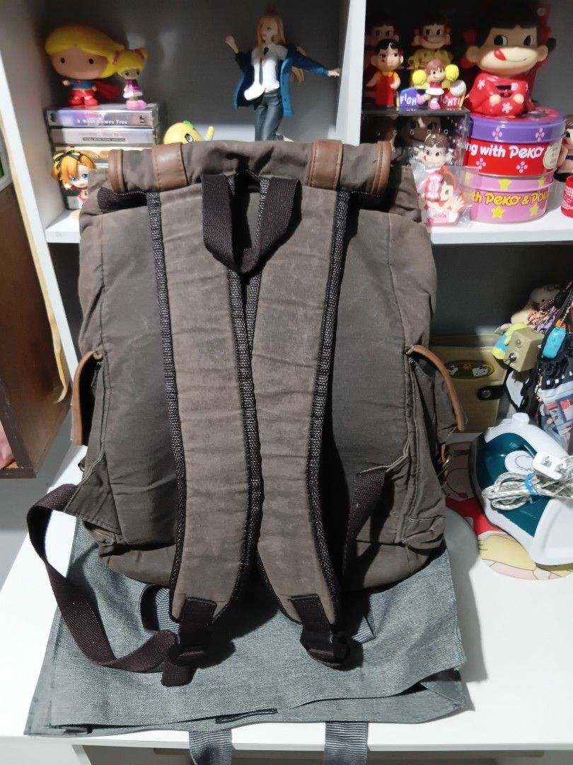 Brown Backpack with Leather Accents (Category: Backpacks) located in Manila. Submitted by leonicotine (Listing ID 1460468367, Image 2). Description: - Durable brown canvas backpack - Genuine leather straps and buckle closures on front pockets - Spacious main compartment with internal zippered pocket - Adjustable shoulder straps for comfort - Ideal for everyday adventures or travel.