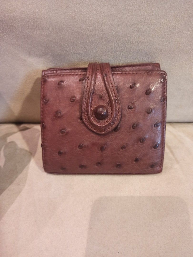 Brown Ostrich Leather Bifold Wallet (Category: Wallets & Card holders) located in Caloocan City. Submitted by rtarellano (Listing ID 1460438405, Image 1). Description: - Brown (strich leather bifold wallet - Multiple card slots inside - Secure snap closure - Ideal size for daily use.