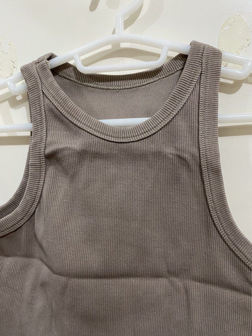 Brown Ribbed Racerback Tank Top (Category: Sleeveless) located in Taguig. Submitted by maly01_ (Listing ID 1460371752, Image 2). Description: - fits small to medium frames dm for inquiries :).