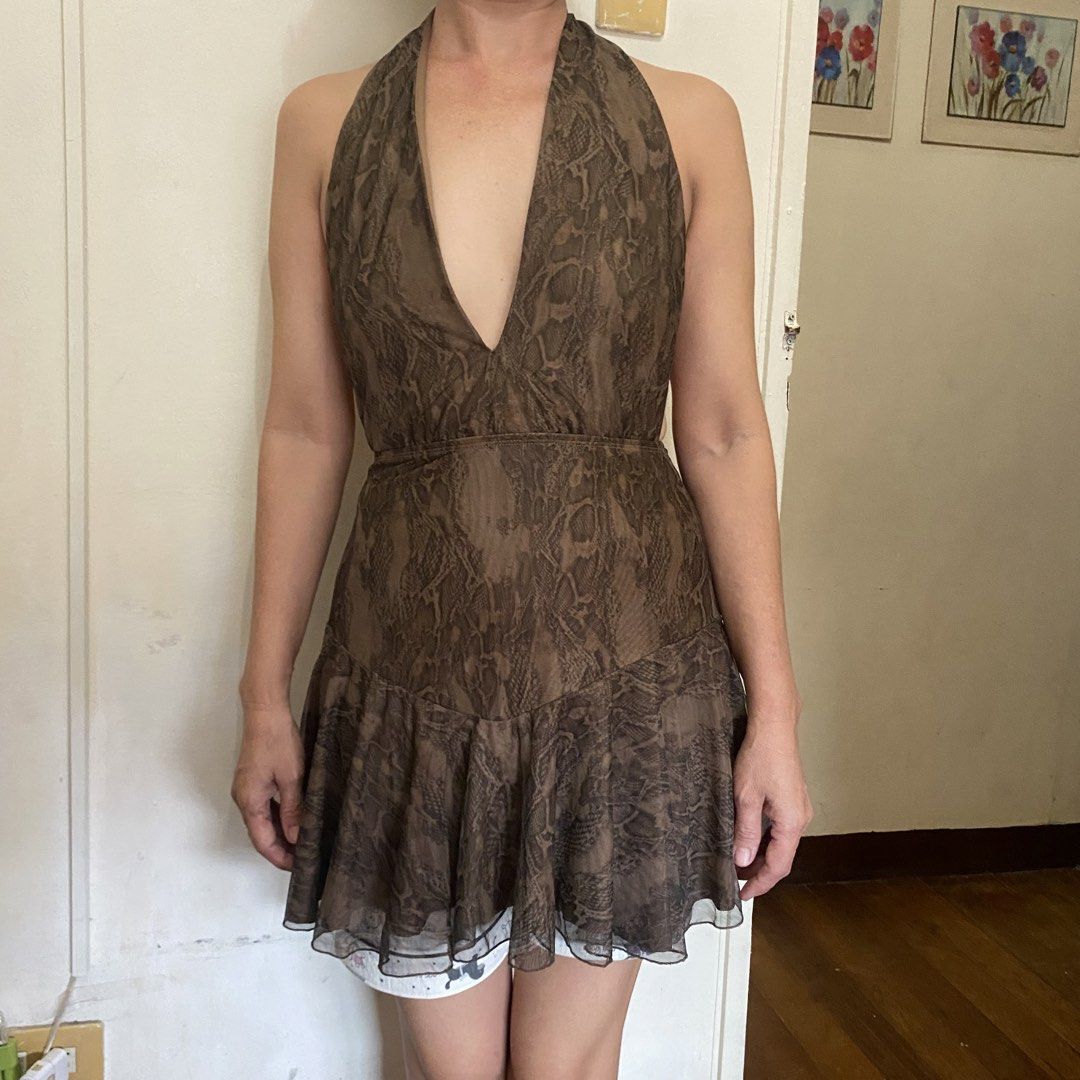 Brown Snake Print Halter Neck Mini Dress (Category: Dresses) located in Bacolor. Submitted by mxspicychicken (Listing ID 1460369710, Image 1). Description: Mesh High Quality - Brown halter neck mini dress - Eye-catching snake print pattern - Flattering deep V-neckline - Chic ruffled hem - Sultry open back design - Sheer fabric with comfortable lining - Ideal for parties and night outs.