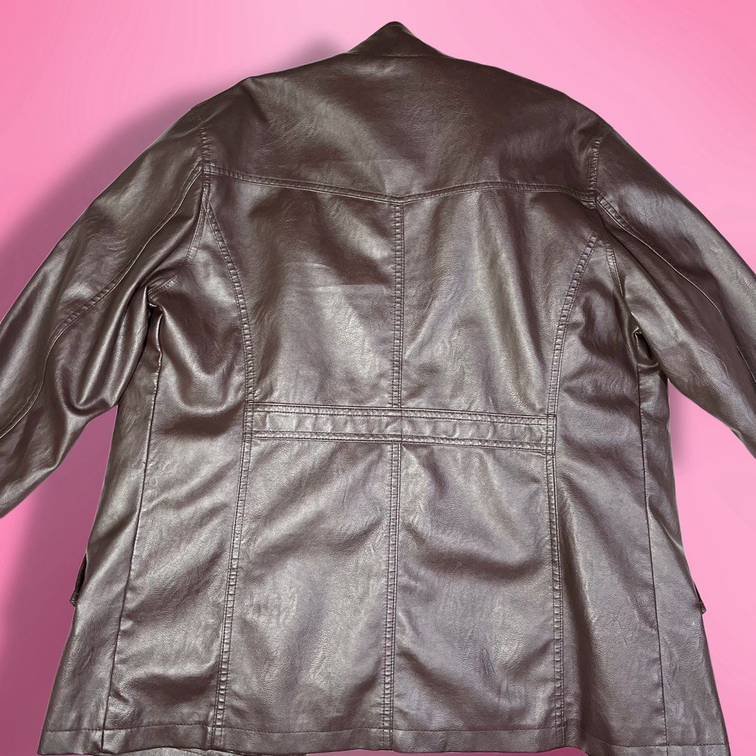Brown Unisex Faux Leather Jacket (Category: Coats, Jackets and Outerwear) located in Quezon City. Submitted by ayzria (Listing ID 1460451042, Image 2). Description: 🎀 brown faux leather jacket a timeless little staple for your next fit ♡ ♡ fits m-l / oversized fit ♡ bust: 44” ♡ shoulder: 18” ♡ sleeve length: 25” ♡ length: 28” ♡ waist: 40” ♡ thick & heavy material ♡ good condition ♡ front pockets + zipper closure.