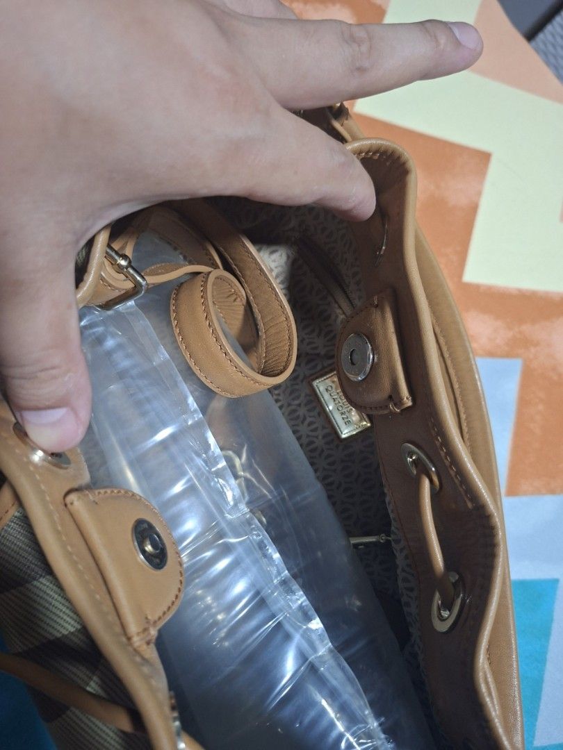Bucket/sling bag/handbag (Category: Cross-body Bags) located in Bulacan. Submitted by orangekitten04 (Listing ID 1460310219, Image 2). Description: still in very good condition. i can send pictures.