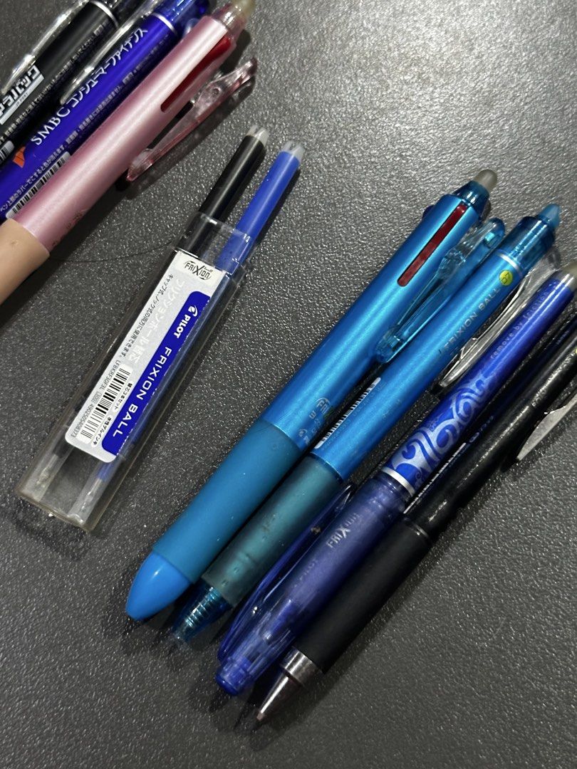 [BUNDLE] Assorted Frixion Pens (Category: Stationery & School Supplies) located in Manila. Submitted by sharksfin06 (Listing ID 1460470354, Image 2). Description: READ DESC WORKING: 2 frixion pens (blue and black) and 1 friction multipen (though only the black ink is working), two frixion refills (black and blue 0.5) BARRELS ONLY: 4 frixion pens at the right side of the refills (3 blues, 1 black) .