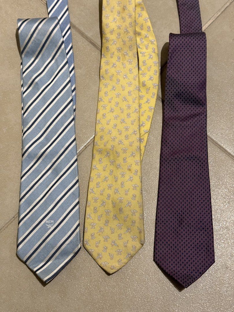 (Bundle) Luxury neckties Celine- MCM - FERRAGAMO selling as bundle only (Category: Ties) located in Taguig. Submitted by jhonnybusinessph (Listing ID 1460311804, Image 2). Description: Wts Pre-loved Luxury neckties Selling as bundle only Celine Salvatore Ferragamo MCM All size 53” Condition: all verygood condition But need a washing Selling as is .