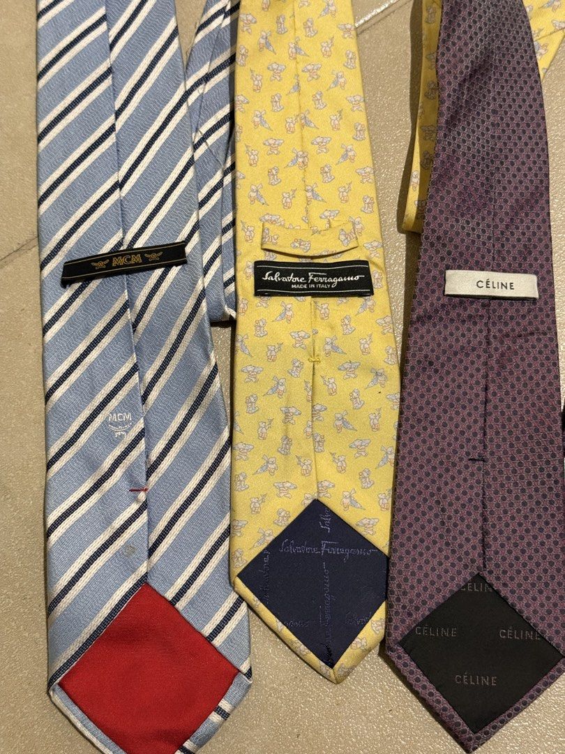 (Bundle) Luxury neckties Celine- MCM - FERRAGAMO selling as bundle only (Category: Ties) located in Taguig. Submitted by jhonnybusinessph (Listing ID 1460311804, Image 1). Description: Wts Pre-loved Luxury neckties Selling as bundle only Celine Salvatore Ferragamo MCM All size 53” Condition: all verygood condition But need a washing Selling as is .