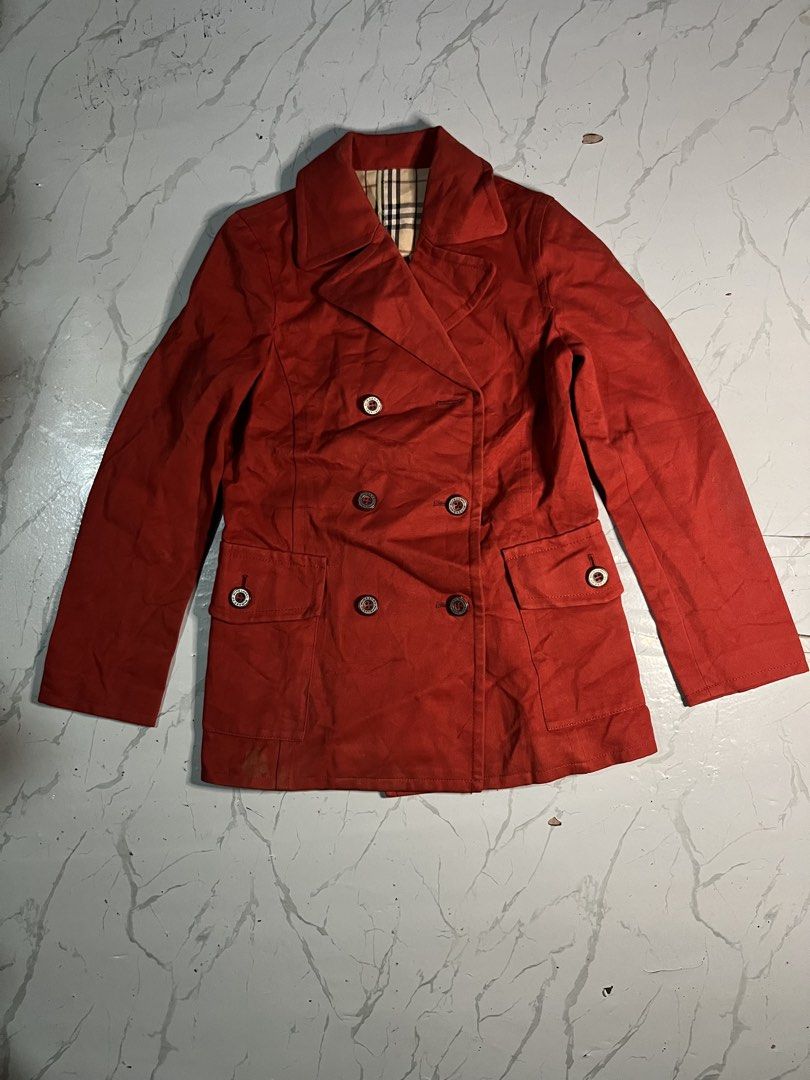 Burberry Blue Label Coat Jacket (Category: Luxury Apparel) located in Zamboanga. Submitted by abubazir7 (Listing ID 1460478646, Image 1). Description: Authentic Burberry Blue Label coat jacket Issue: Missing button and minimal scratch visible on a last 2 photo Blue Label was an exclusive sub-brand developed by Sanyo Shokai specifically for the Japanese market, tailored for a more youthful, slim-fitting aesthetic. Size 38 Measurements Length 27 Wi