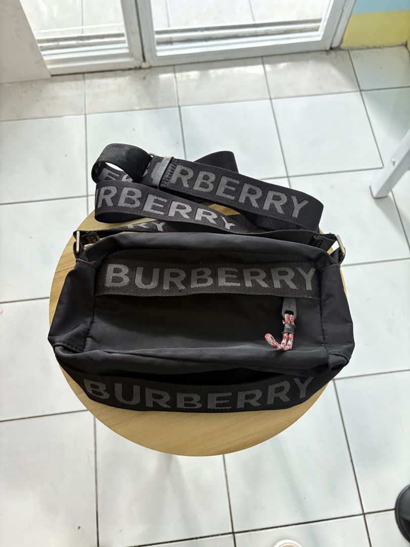 Burberry nylon sling bag (Category: Sling Bags) located in Batangas. Submitted by urbanhunter. (Listing ID 1460354833, Image 1). Description: Burberry nylon sling bag Issue: last pic (not noticeable since nasa loob) 2000 free shipping.