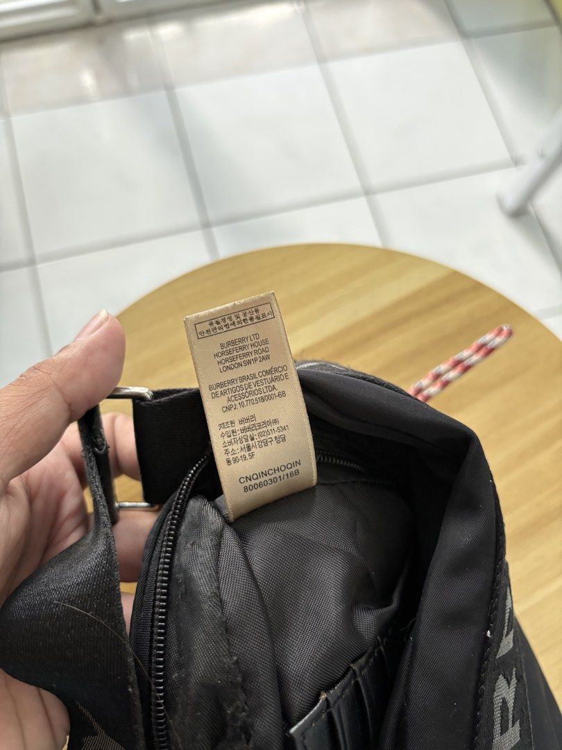 Burberry nylon sling bag (Category: Sling Bags) located in Batangas. Submitted by urbanhunter. (Listing ID 1460354833, Image 3). Description: Burberry nylon sling bag Issue: last pic (not noticeable since nasa loob) 2000 free shipping.