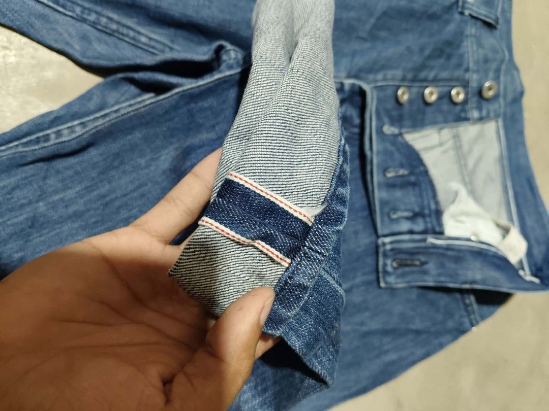 Buttons,Selvedge Blue Denim Jeans (Category: Activewear) located in Mawab. Submitted by kingacecruda (Listing ID 1460469189, Image 2). Description: - Classic blue denim jeans - Button fly closure - Straight leg fit - Selvedge detail on cuff (visible when rolled) - Ideal for everyday wear - Dimes : 32x39.6.