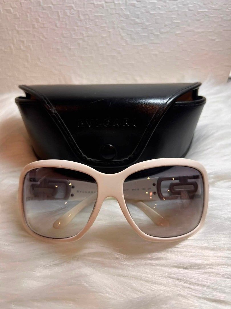 Bvlgari Sunglasses with Case (Category: Sunglasses & Eyewear) located in Manila. Submitted by jiainah (Listing ID 1460381473, Image 1). Description: - Authentic Bvlgari sunglasses - Cream colored frames with gradient lenses - Bvlgari logo visible on the arms - Comes with original Bvlgari hard case - Ideal for sunny weather.