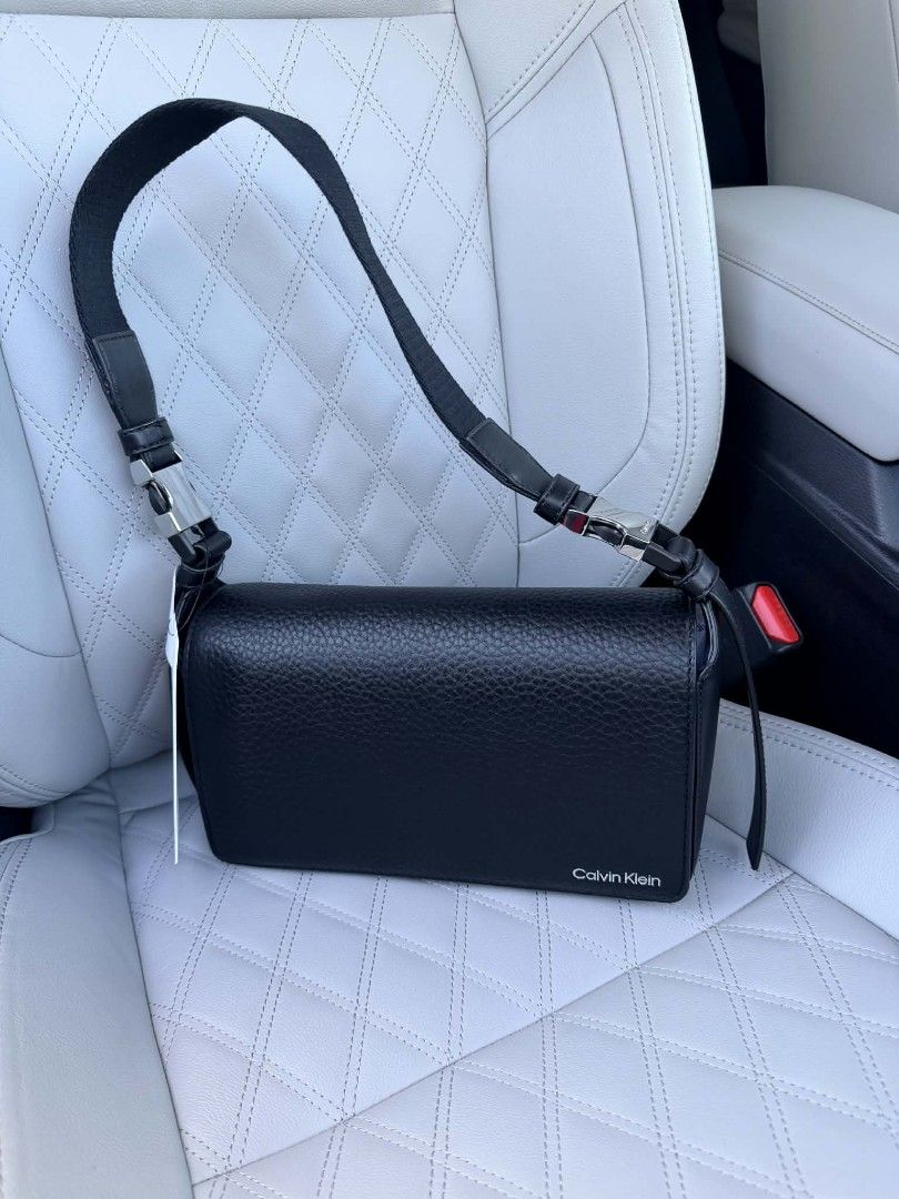 Calvin Klein Shoulder Bag (Category: Shoulder Bags) located in Manila. Submitted by grinvelvet (Listing ID 1460428647, Image 1). Description: 💯 Original Pure pebbled leather, color black On hand, from canada.