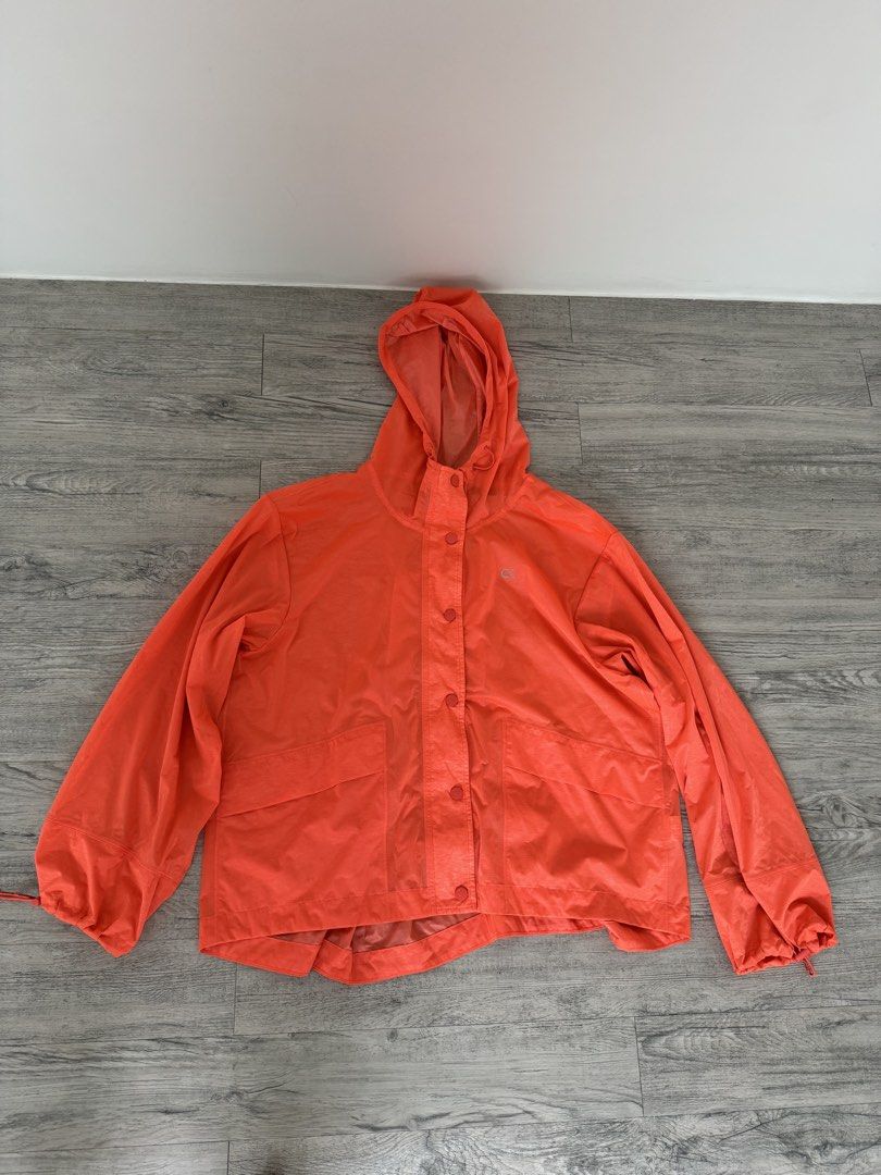 Calvin Klein Windbreaker Raincoat (Category: Coats, Jackets and Outerwear) located in Manila. Submitted by celestial08 (Listing ID 1460443583, Image 2). Description: Pre-loved but well maintained, with no visible stains, damage, peeling, or other flaws. Lightweight and suitable for rainy or windy weather..