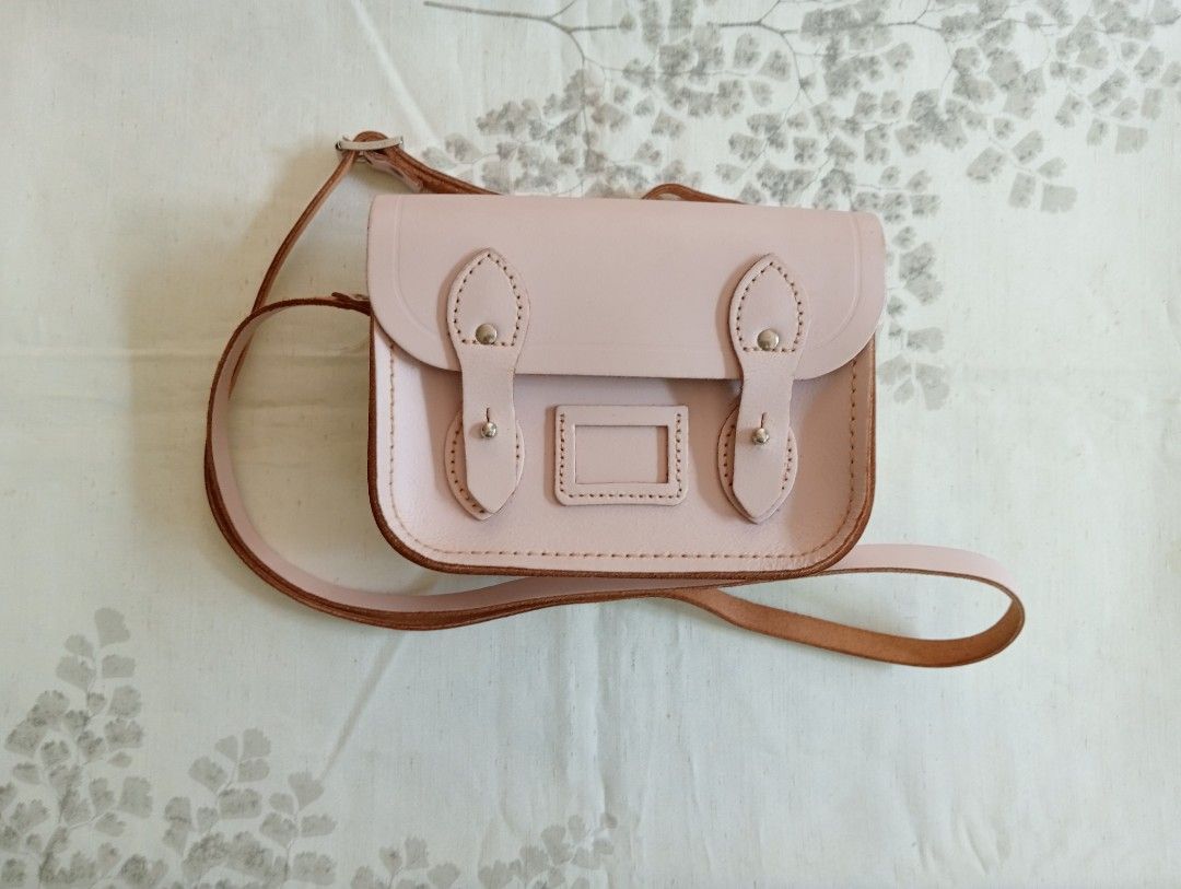 Cambridge Satchel Company The Tiny (Category: Cross-body Bags) located in Bacoor. Submitted by anarkaye (Listing ID 1460344152, Image 1). Description: Cambridge Satchel Company The Tiny in Pastel Pink Genuine Leather .